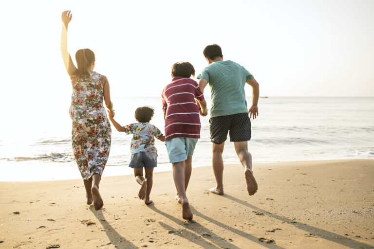 asian-family-playing-at-the-beach