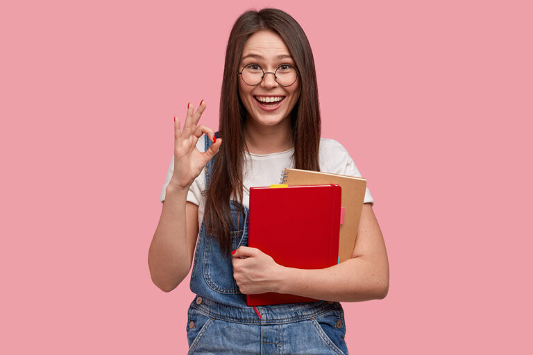 smiling-woman-with-ok-hands